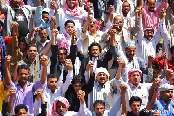 Yemeni people in 2011, demonstrating peacefully for economic and social reform.