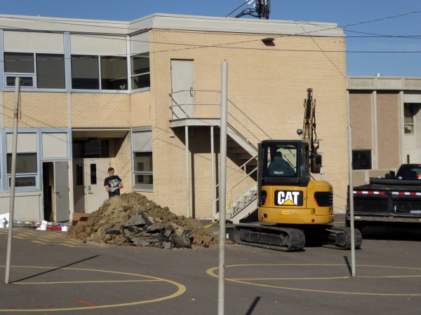 Trying to cut into the sewer line at Adventure Elementary School in Mapleton (just north of Denver) to locate the source of the stench