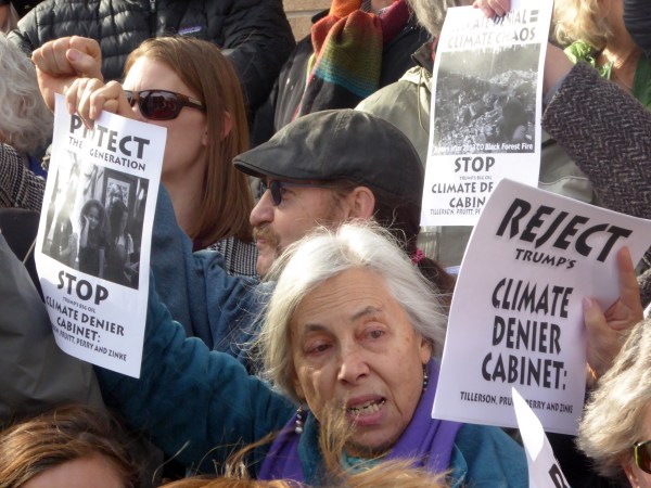 Picketers at Senator Michael Bennet's (D-CO) office calling on the Senator to vote against the confirmation of climate-denying cabinet hopefuls.